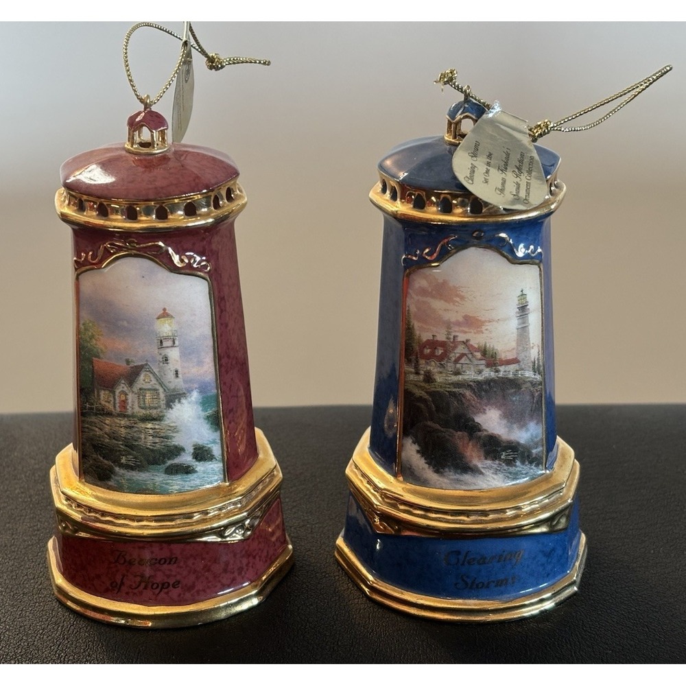 2 Thomas Kinkade Lighthouse Ornaments Seaside Reflections Clearing Storms Hope